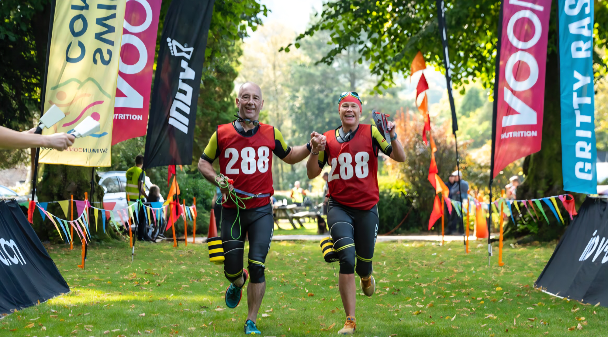 Athletes celebrating at the finish of an endurance event